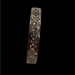 COACH BANGLE 💯 %AUTHENTIC HAS ONE BAR ON IT SAYING COACH THE REST ARE C